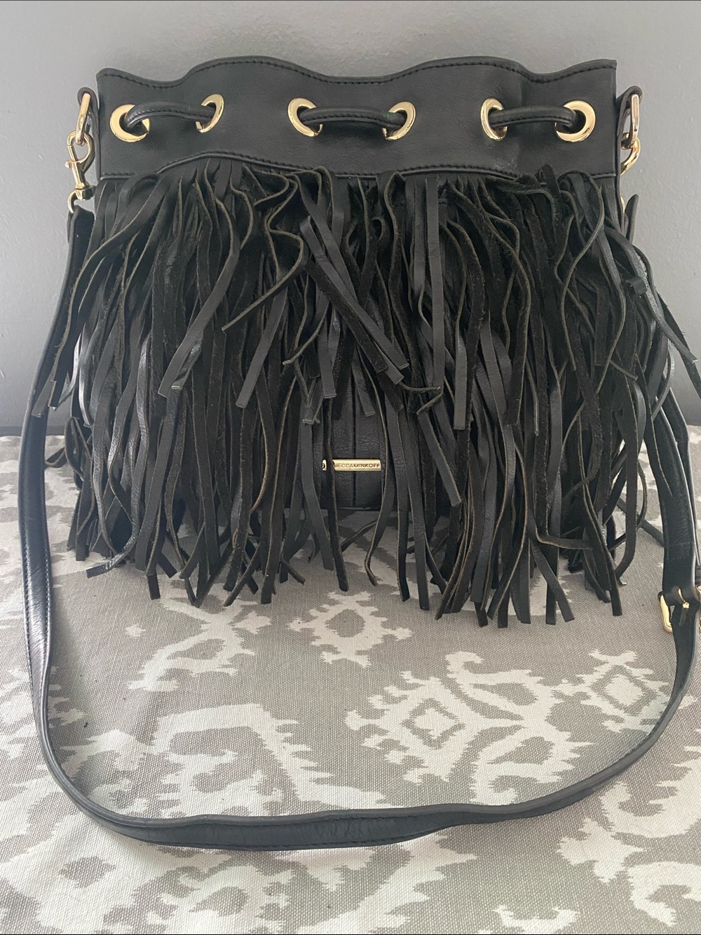 Rebecca Minkoff Black Leather Fringe Bucket Bag with Snap and Drawstring Closure